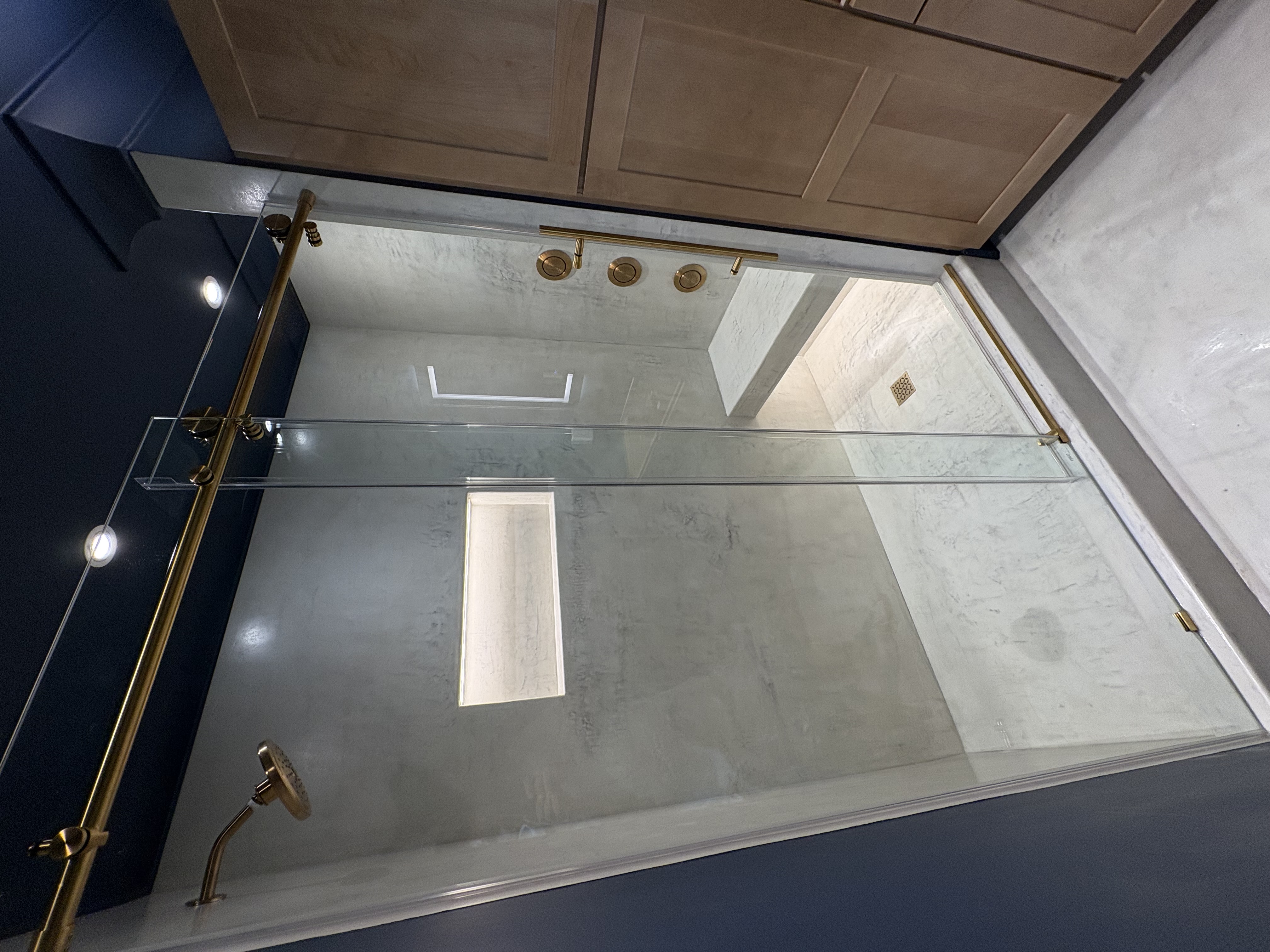 Bathroom retrofit lighting with navy ceiling — Mosch Scottsdale